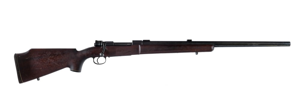 L.R. Wallack JR. Custom Mauser .219 Rifle: Description L.R. Wallack JR. Custom Mauser chambered in .219 Donaldson Wasp with a integral magazine and a 26" bull barrel. Drilled and tapped barrel with mounts. Mauser style action and bolt. Blued f