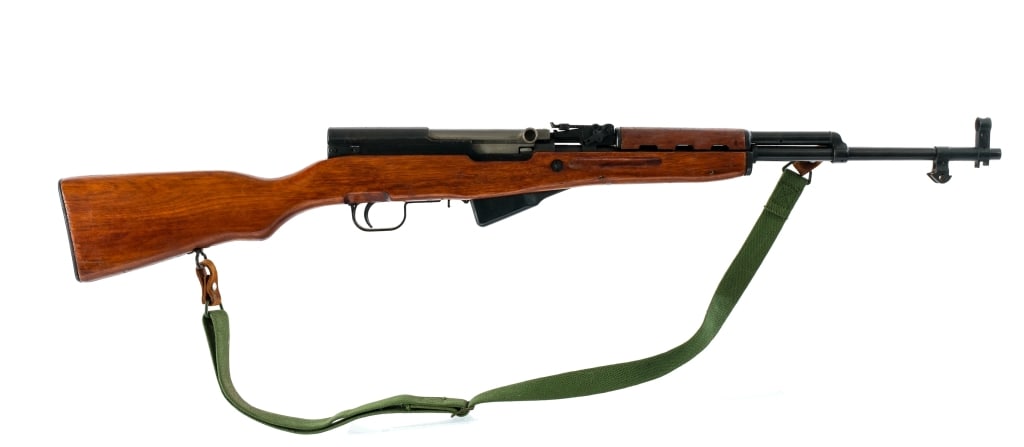 Norinco Type 56 SKS 7.62x39mm Semi Auto Rifle: Description Chinese Norinco Type 56 SKS chambered in 7.62x39mm with a ten round integral magazine and a 20" barrel. Imported by Century Arms, marked on the left side of the receiver. The front bayonet