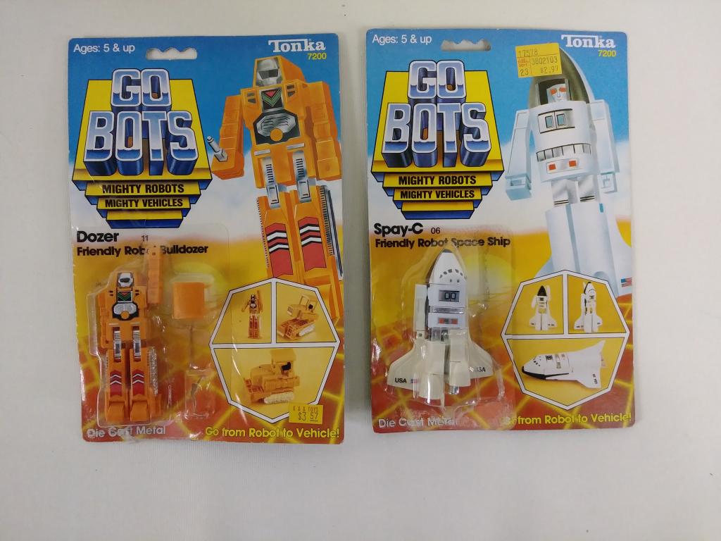 2pc Vtg Tonka GoBots w/ Package: Bubbles have been lifted. Dozer is missing his gun