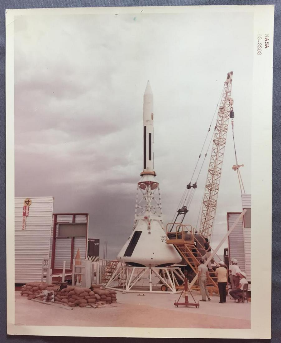 BP-6 Launch Escape System test Sept, 1963: This early test boiler Plate named the Tiki Hut is fitted with a launch escape tower for early testing. A great red numbered photograph in near pristine condition with a factory blemish on the left bo