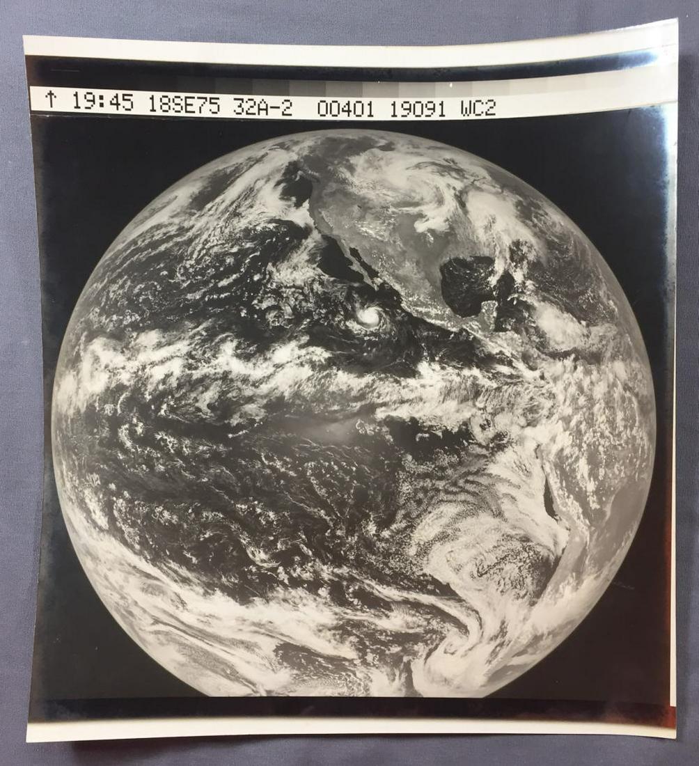 Original Black & White test photograph of Earth unusual: This unusual photograph of the planet Earth is 10" wide x 11" tall and has a grey scale at the top along with numbers I can not decipher. This is an Original silver halide photo with silver toning on 
