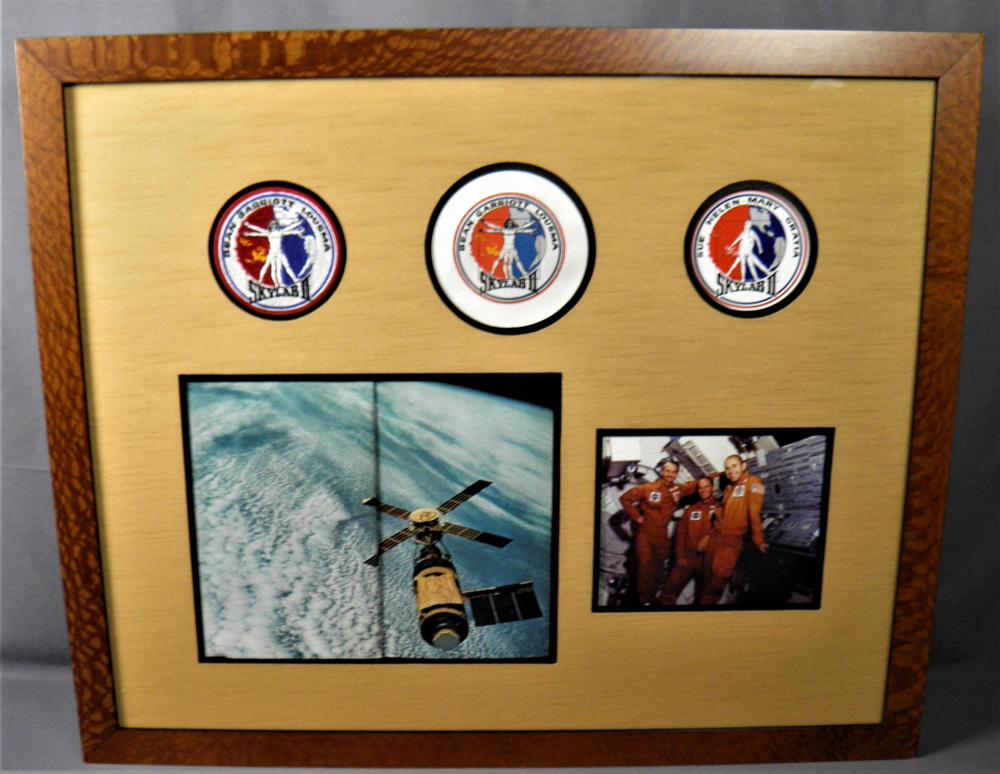 Skylab 2 Memorabilia Framed Display: A beautiful Skylab 2 framed display that includes a crew lithograph along with a picture of the Skylab Space Station and a set of patches including an authentic Beta Cloth Crew Patch, a 4" round crew
