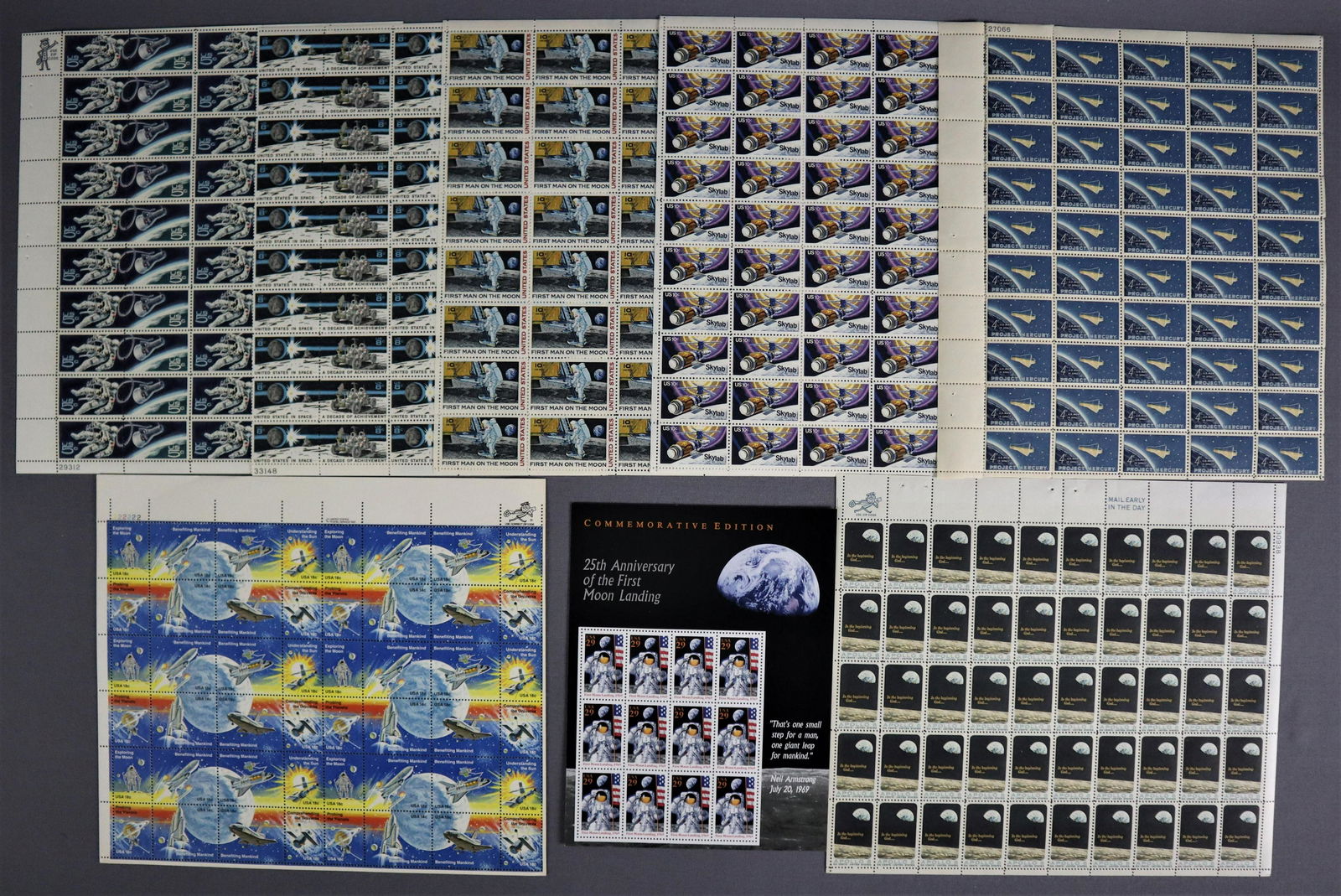 Full Sheet Space Stamp Blocks: These are full uncut stamp sheets for some of the most iconic Space themed stamps issued by the U.S. Postal Office. These are all in near mint condition with minor handling wear.