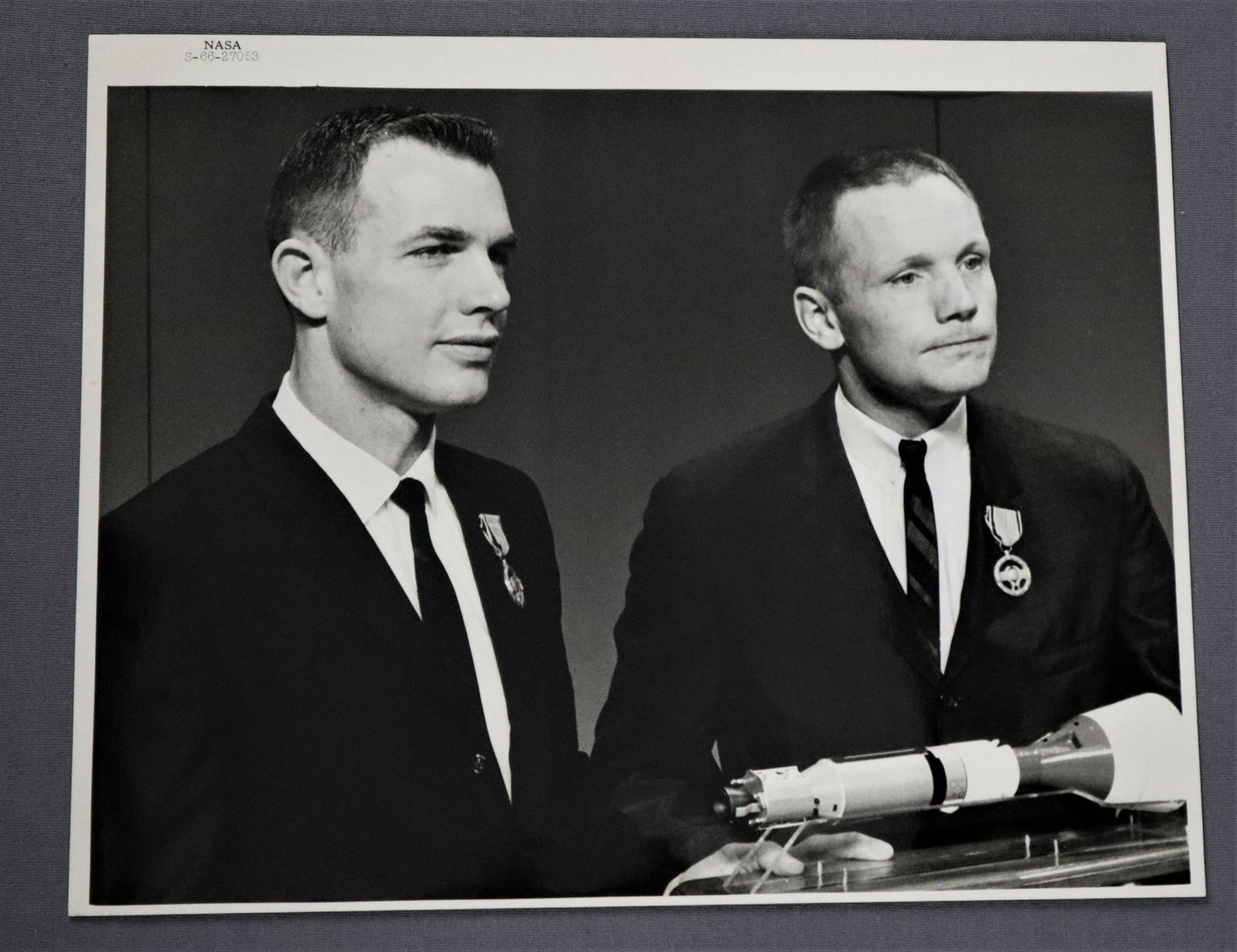 Neil Armstrong & Dave Scott Exceptional Service Medal: An original and numbered photograph of Astronauts Neil Armstrong and David Scott with their exceptional service awards following the Gemini 8 Mission. This photo is in near mint condition.