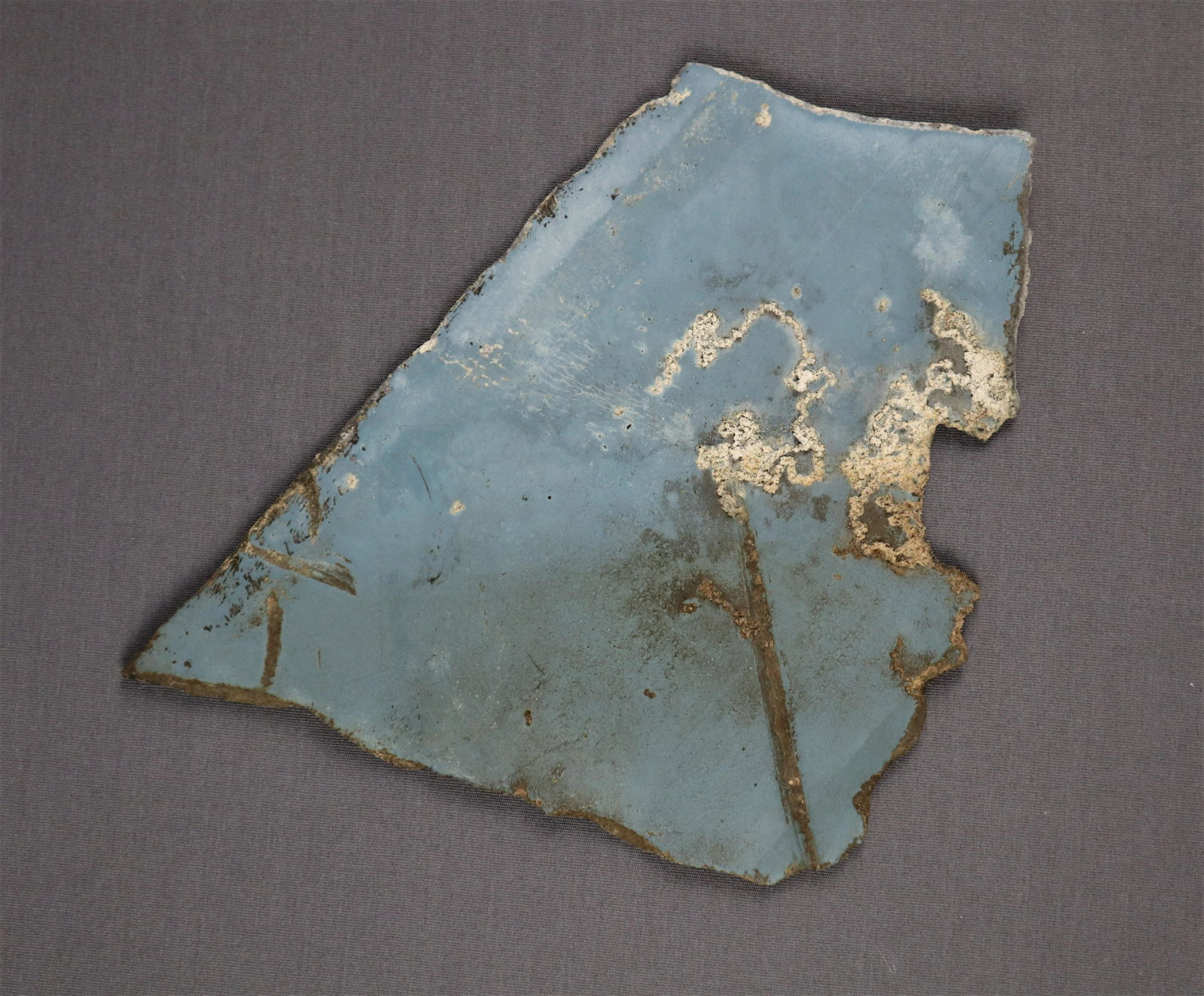 Large Section of Navaho Missile: A large section of skin from the Navaho Missile from the personal collection of a long time employee of North American Aviation. This section measures about 6 1/2" x 7" and still retains its original 