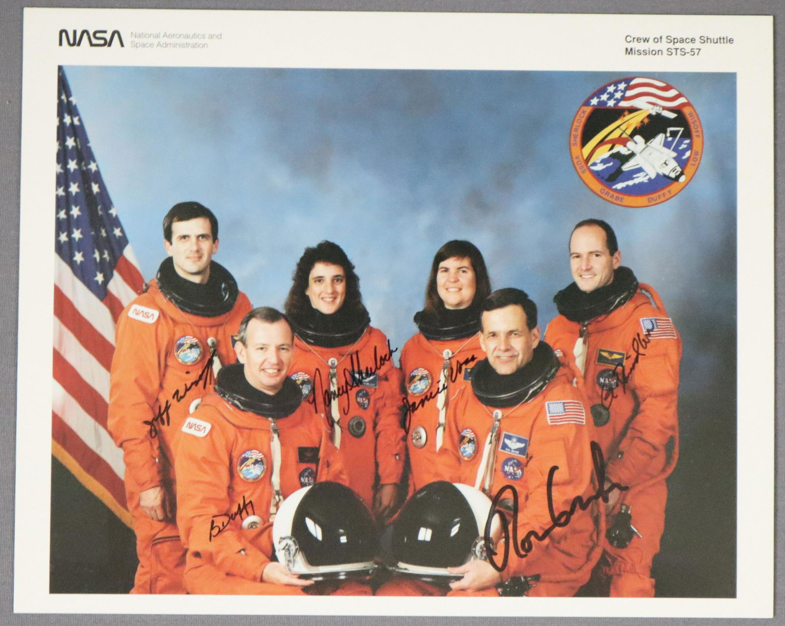 STS-57 Crew Signed NASA Lithograph: An official NASA STS-57 Crew portrait lithograph that has been hand signed by every member of the crew including Commander Ronald J. Grabe, Pilot Brian Duffy and crew members David Low, Nancy Jane She