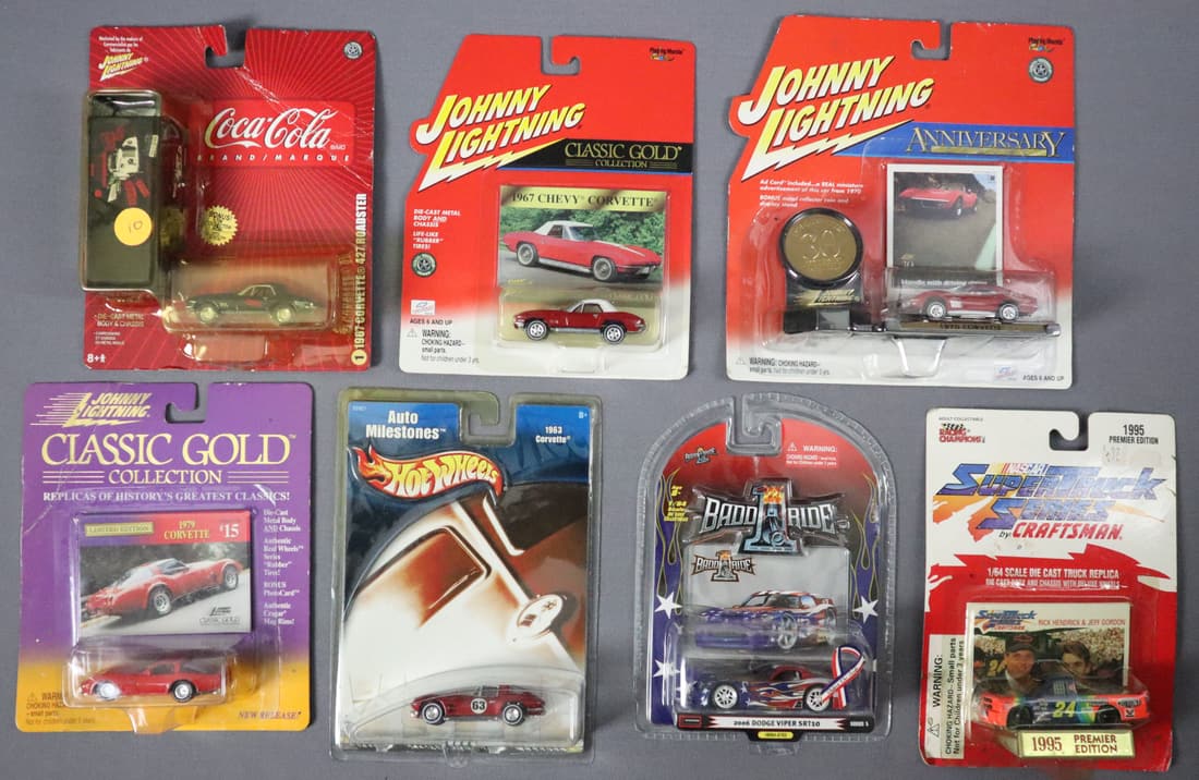 7 - Variety Collection of 1/64 Scale Die Cast Cars: This lot consists of a variety of 7 different 1/64 scale die cast metal cars. There is a Coca Cola 1967 Corvette 427 Roadster with tin, a Badd Ride 1 2006 Dodge Viper SRT10, a Hot Wheels 1963 Corvette