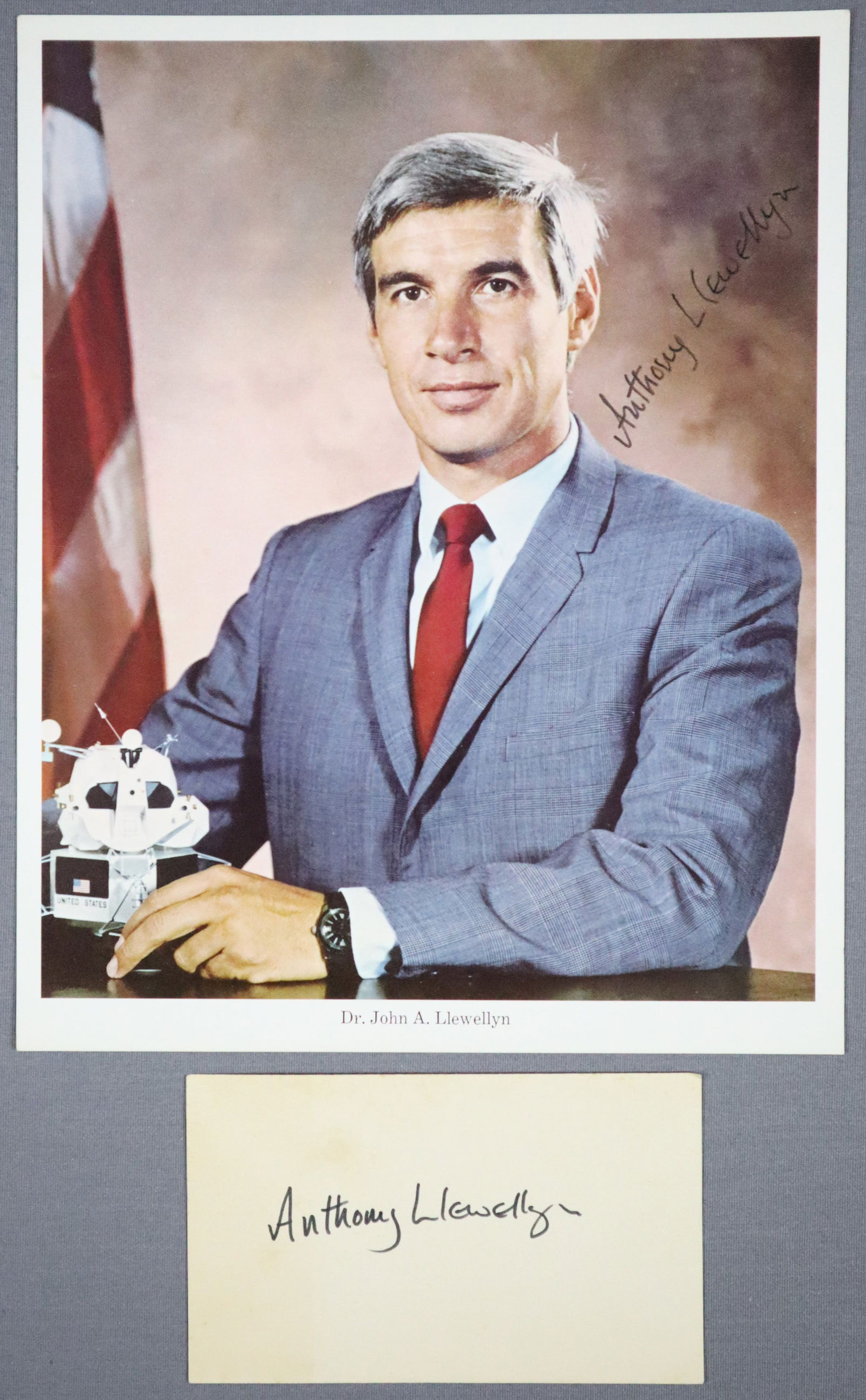 2 - Anthony Llewellyn Signed Apollo Era Items: An official NASA issued photograph of John Anthony Llewellyn who was a Welsh-born American chemist, a former NASA astronaut candidate and a NOAA aquanaut. This 8" x 10" photograph is hand signed by An