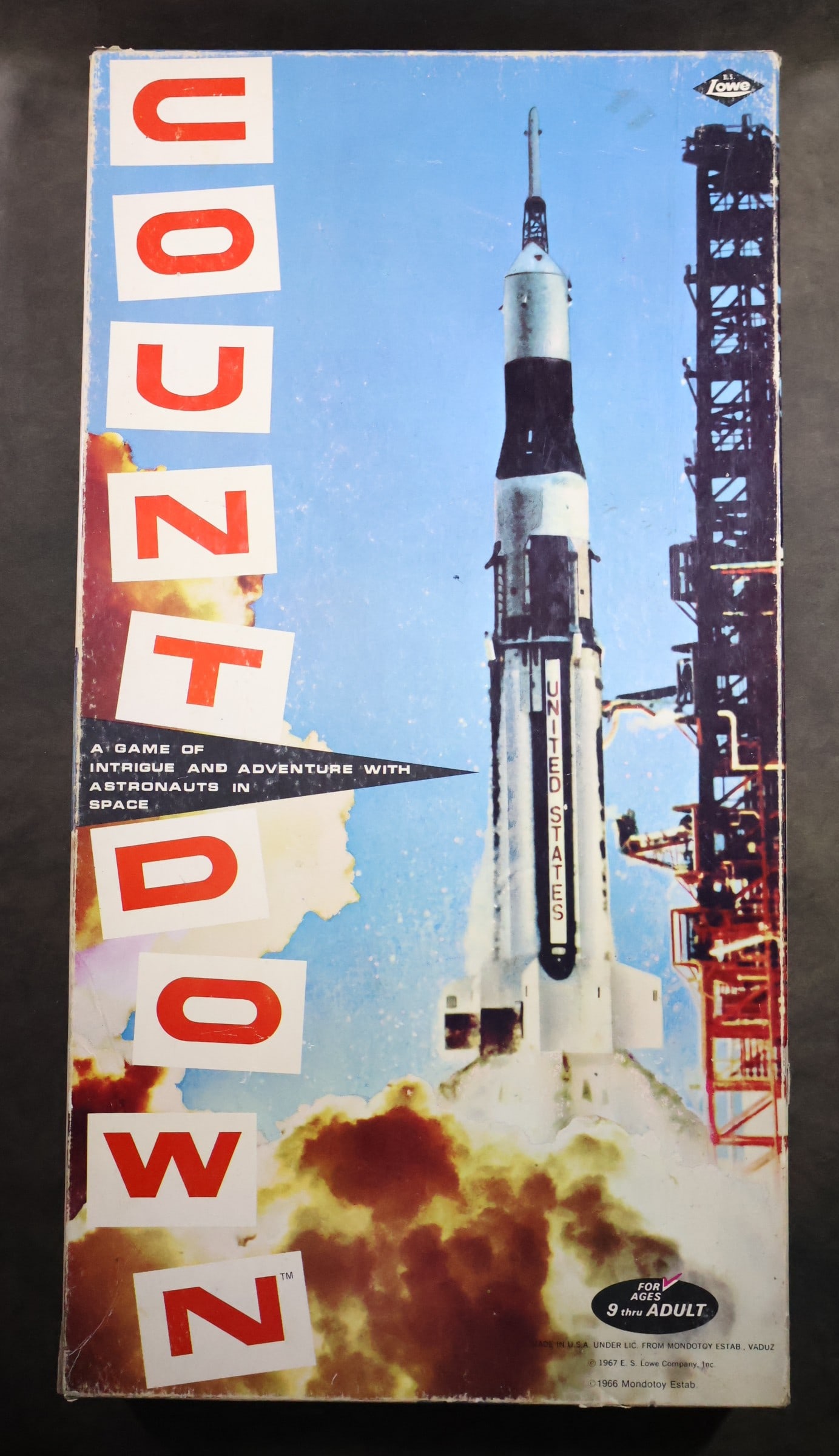 Vintage 1967 "Countdown" Board Game: A vintage 1967 "Countdown - The adventure in Space Game" board game manufactured by the E.S. Lowe Company, Inc. The board game has never been played and the game pieces are still sealed in the