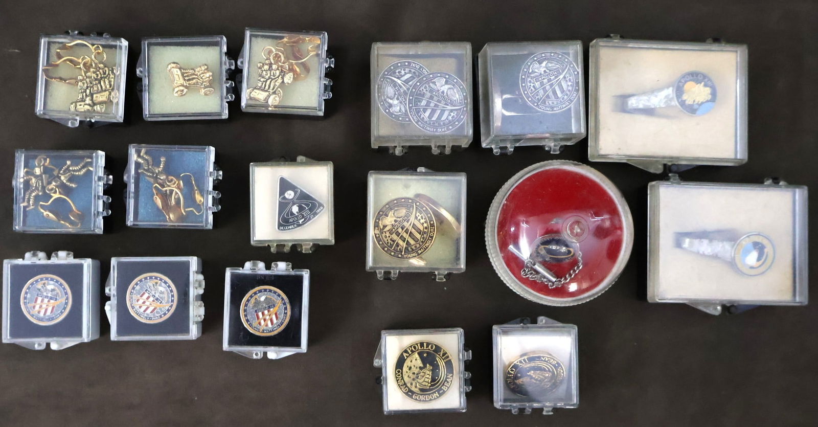 Apollo Era Employee Jewelry Collection: A very nice collection of Apollo era jewelry that was gifted to NASA employees throughout the Apollo program. Amongst this collection there are tie clips, lapel pins, cuff links and clip on astronaut
