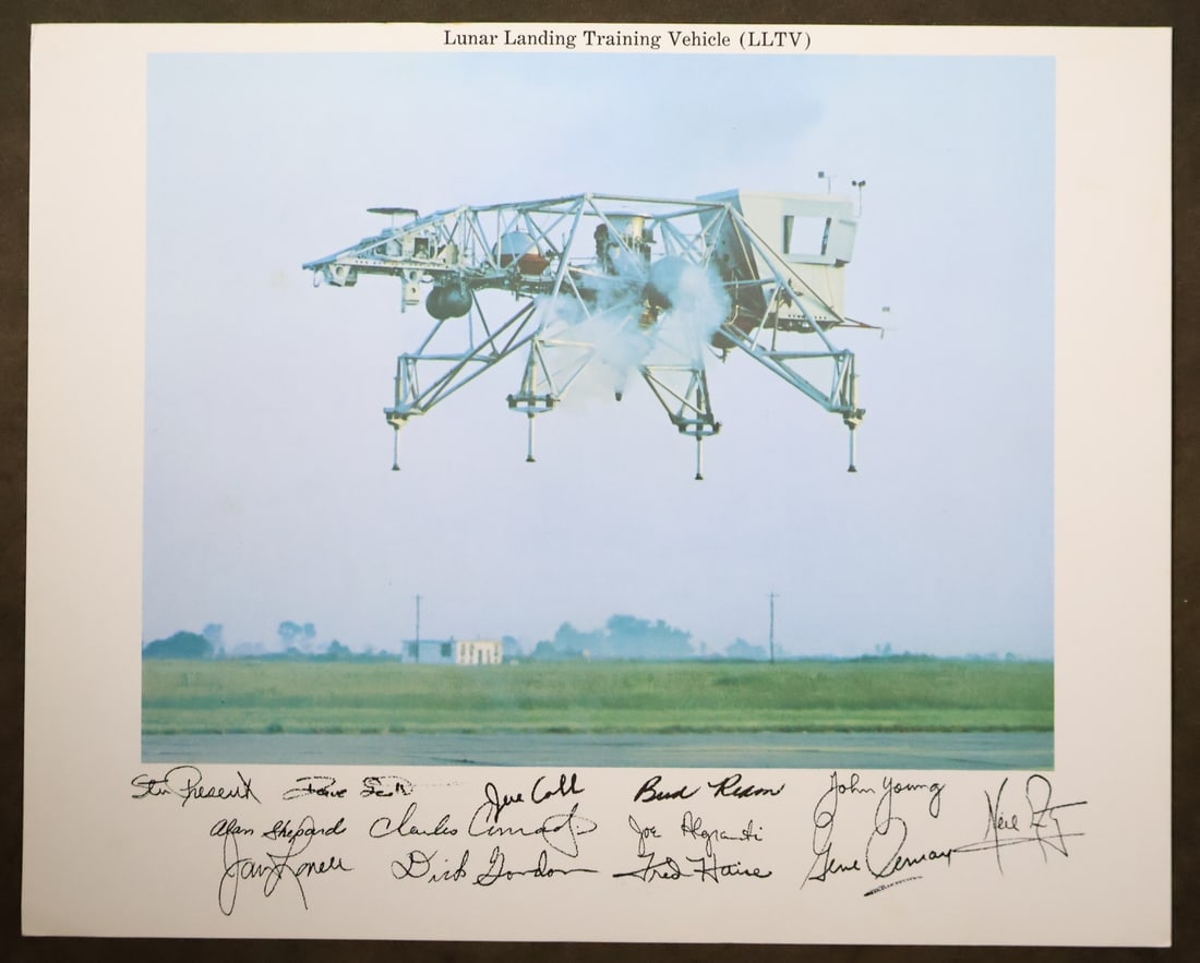 NASA Lunar Landing Training Vehicle Lithograph: An original NASA issued lithograph showing the Lunar Landing Training Vehicle (LLTV) during the test flight used to familiarize the Apollo astronauts with the techniques of landing a Lunar Module on