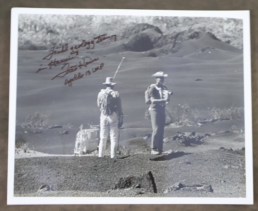 Fred Haise Signed Geology Training Photograph: A vintage Photograph showing Fred Haise and James Lovell in Hawaii working on Field Geology Training in preparation for the Apollo 13 mission. This 8" x 10" photograph is in very good condition with