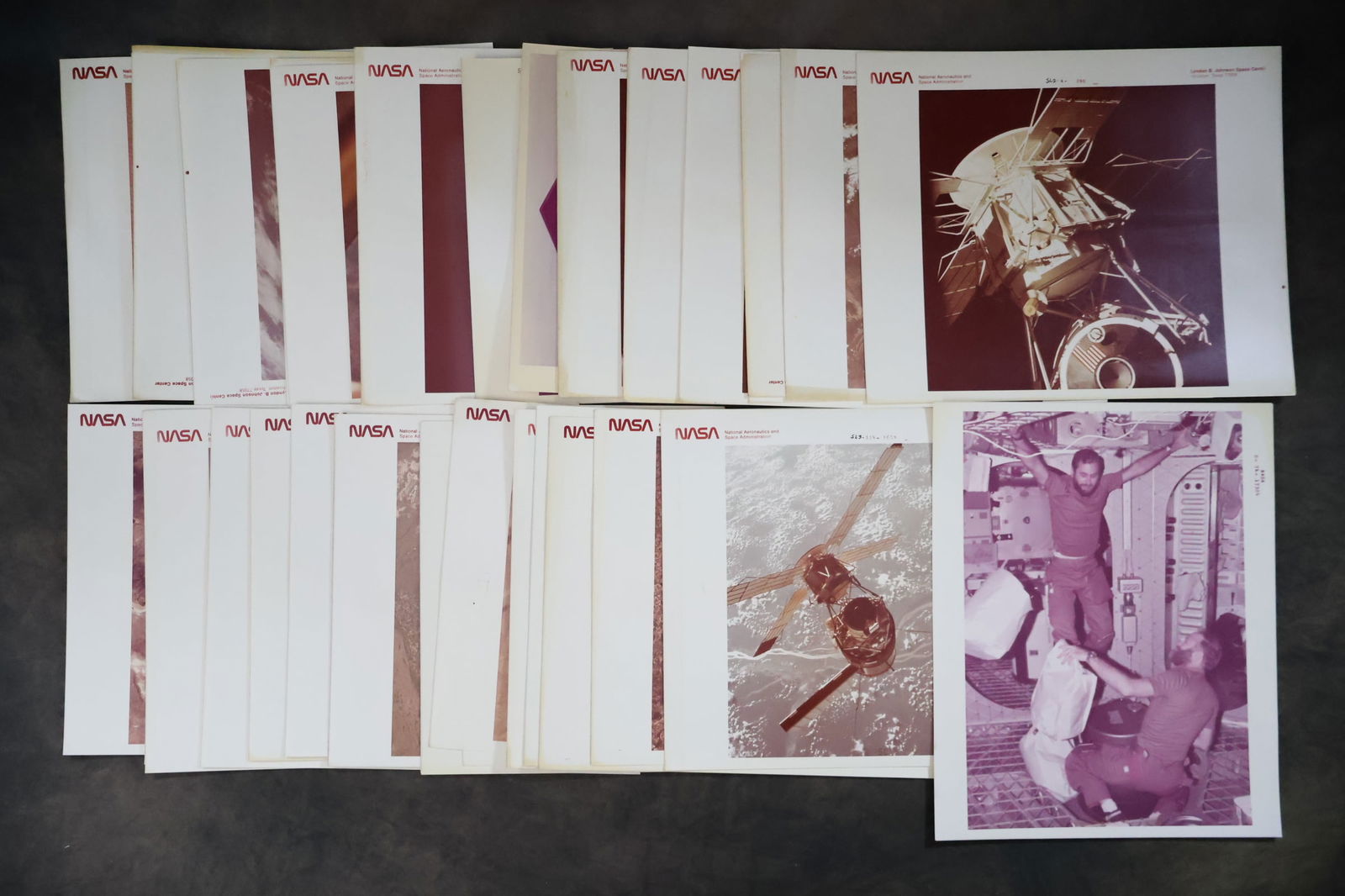 30- NASA Skylab Red Numbered Photographs: A selection of thirty NASA red numbered photographs showing images from the Skylab Program (Skylab 2, 3 & 4). These 8" x 10" photographs are in good condition with visible edge and corner dings an