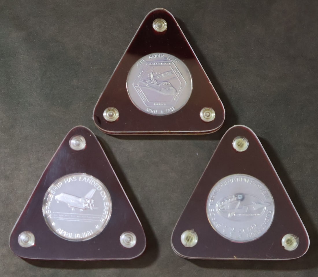 3 - Silver .999 Space Shuttle Mission Coins: These pure silver 999/1000 silver coins in decretive display holders were produced by Galaxy Metals located in Titusville, Florida during the shuttle program and cover different early missions . Each
