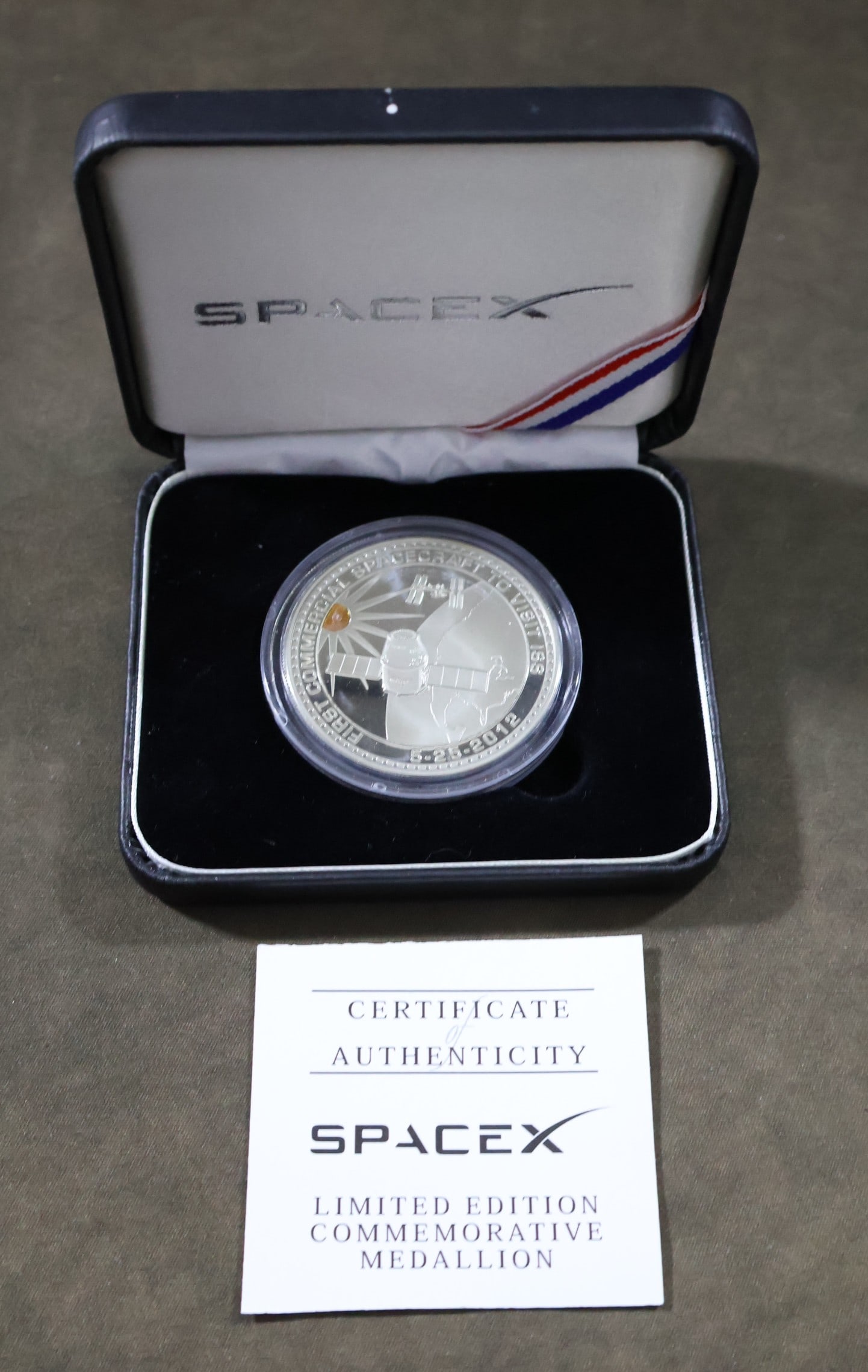 SpaceX Flacon 9 Limited Edition Coin Containing Flown Metal with COA: Limited Edition SpaceX Cots Demo 2+ Falcon 9 Dragon First Commercial Spacecraft to Visit the ISS 5-25-2-12 Medallion containing small piece of copper from Dragon's cargo that was Flown in Space. The