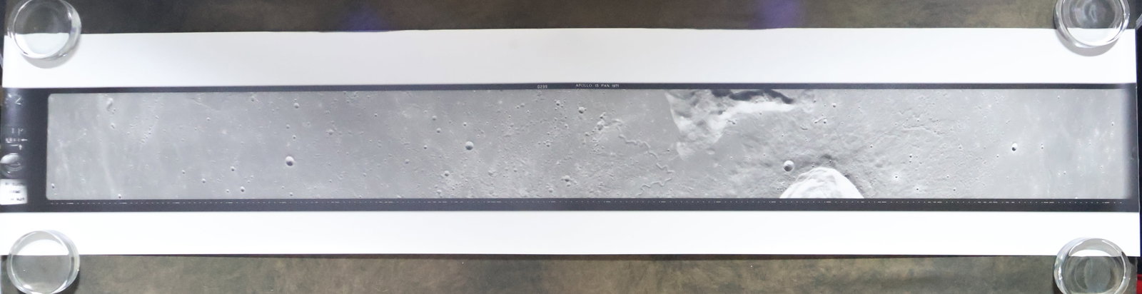 Rare Apollo 15 Panoramic Lunar Surface Photograph: This is a 1971 Apollo 15 rare panoramic photographic view of the Lunar Surface, image #0299. This black and white photograph measures 10" x 48" and is in near mint condition. It has been stored