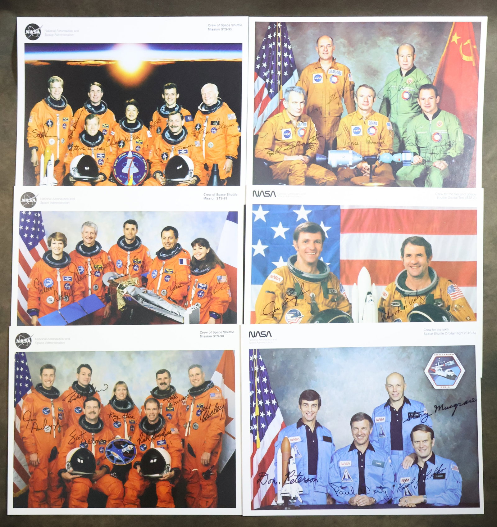 14 - Original NASA "Autopen" Crew Signed Lithographs: A collection of 14 original NASA issued lithographs for different Space Program missions including STS-1, 2, 5, 6, 8, 9, 54, 85, 86, 87, 90, 93, 95 and ASTP. Each 8" x 10" lithograph displays the