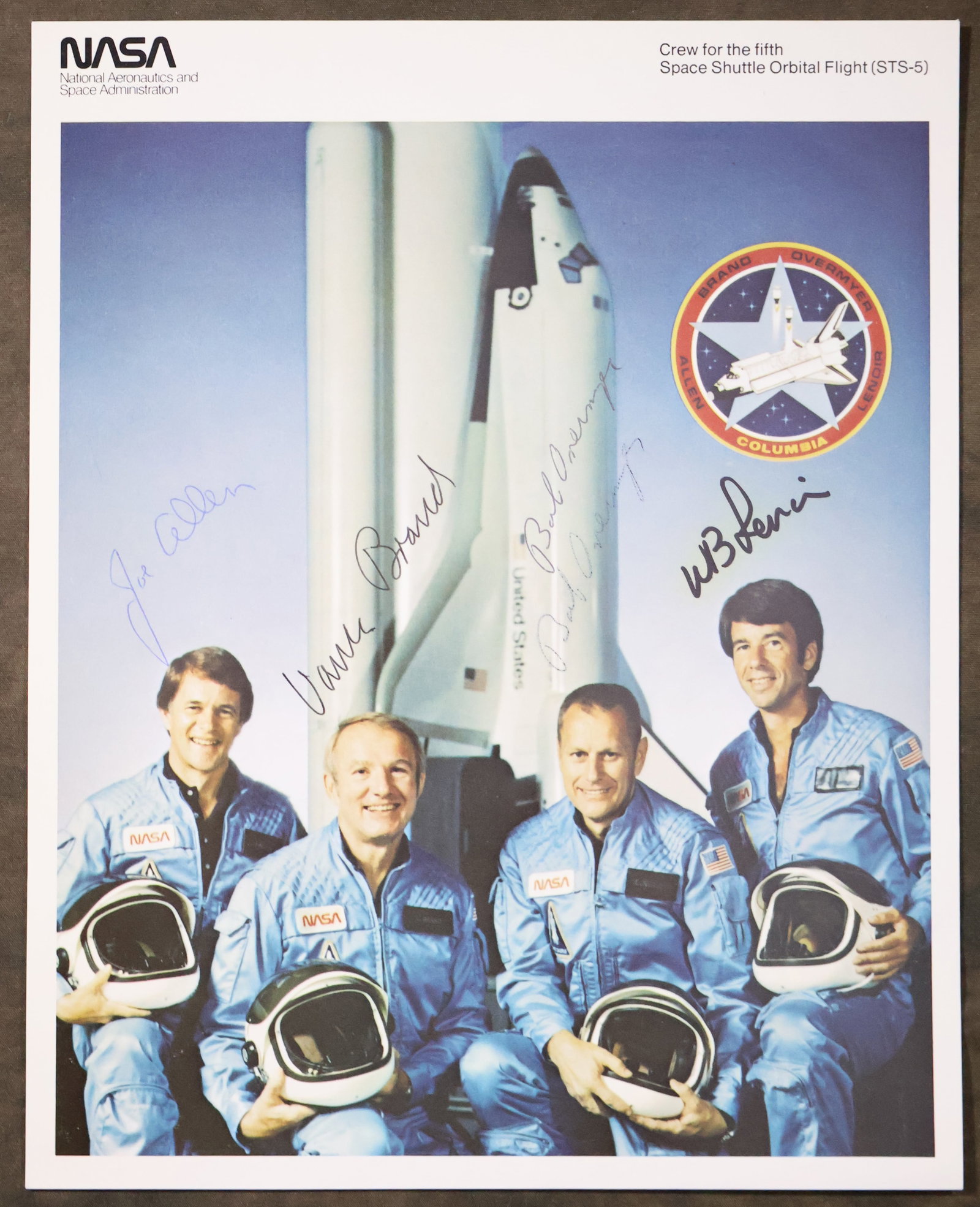 Official NASA STS-5 Crew Signed Lithograph: An official NASA issued lithograph for the STS-5 mission that has been hand signed by the full crew members of the mission - astronauts Joe Allen, Vance Brand, Bob Overmyer (signed twice) and William