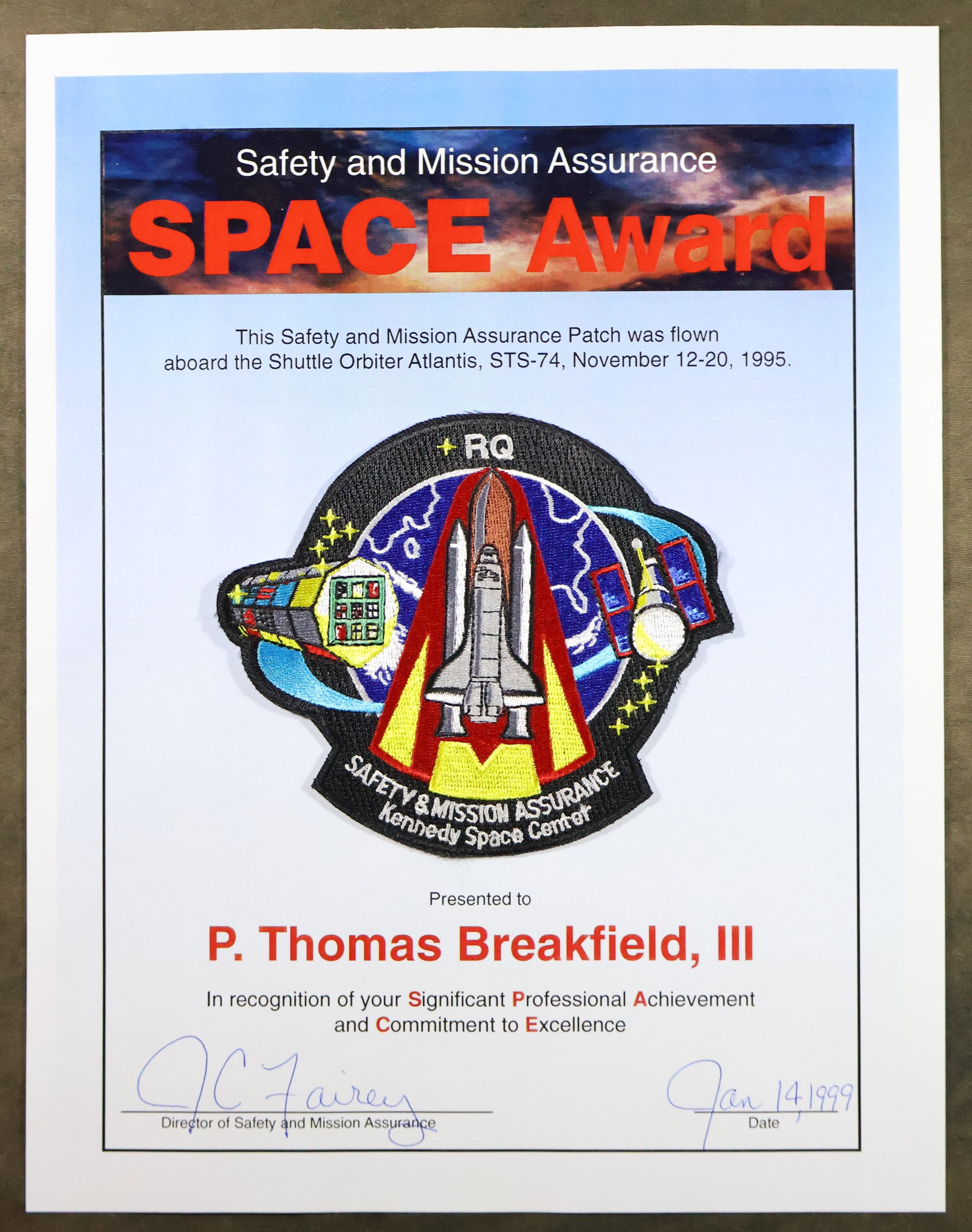 STS-74 Flown Safety & Mission Assurance Patch Award: A Safety and Mission Assurance 4" patch that was flown aboard the Space Shuttle "Atlantis" during the STS-74 mission on November 12-20, 1995. The patch is in near mint condition. It was awarded to Pau