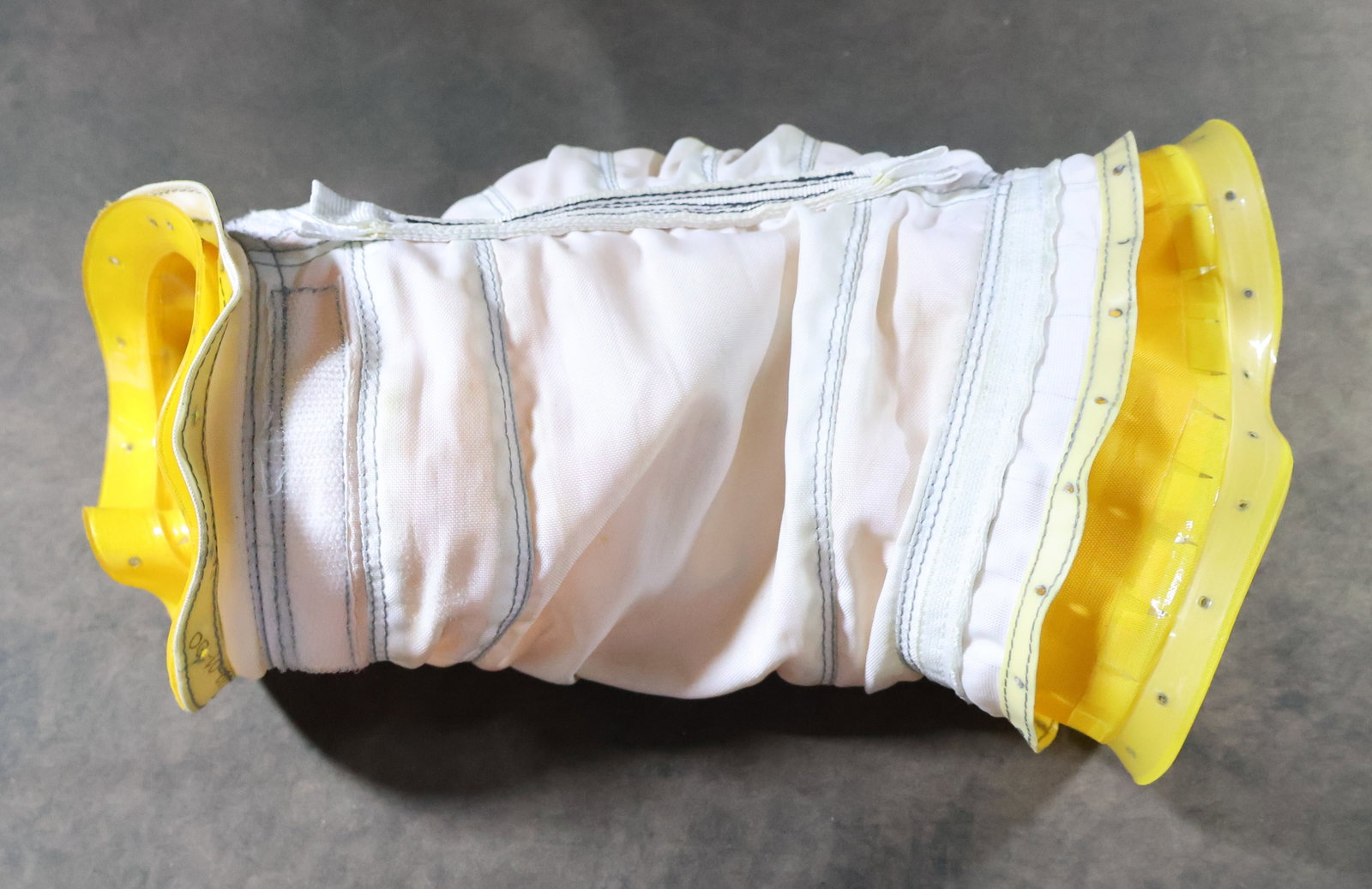 Space Shuttle Suit Elbow Joint Assembly-Critical Flight Hardware with COA: A rare elbow joint assembly which provided the astronaut with arm mobility in the pressurized space suit while performing EVA activities outside the Space Shuttle and International Space Station. The