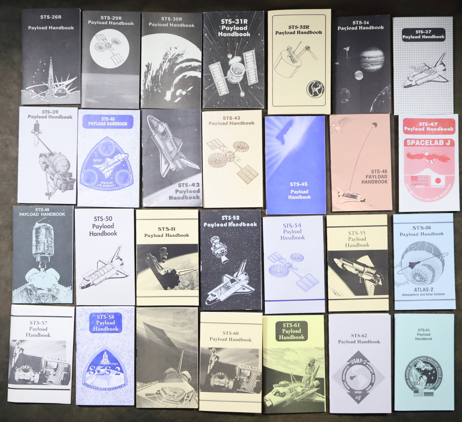 42 - Shuttle Mission Payload Handbooks: A collection of forty two official NASA Space Shuttle Mission Payload handbooks. These cover missions from STS-26 through STS-80. There is only one duplication (STS-68). These handbooks are in excelle