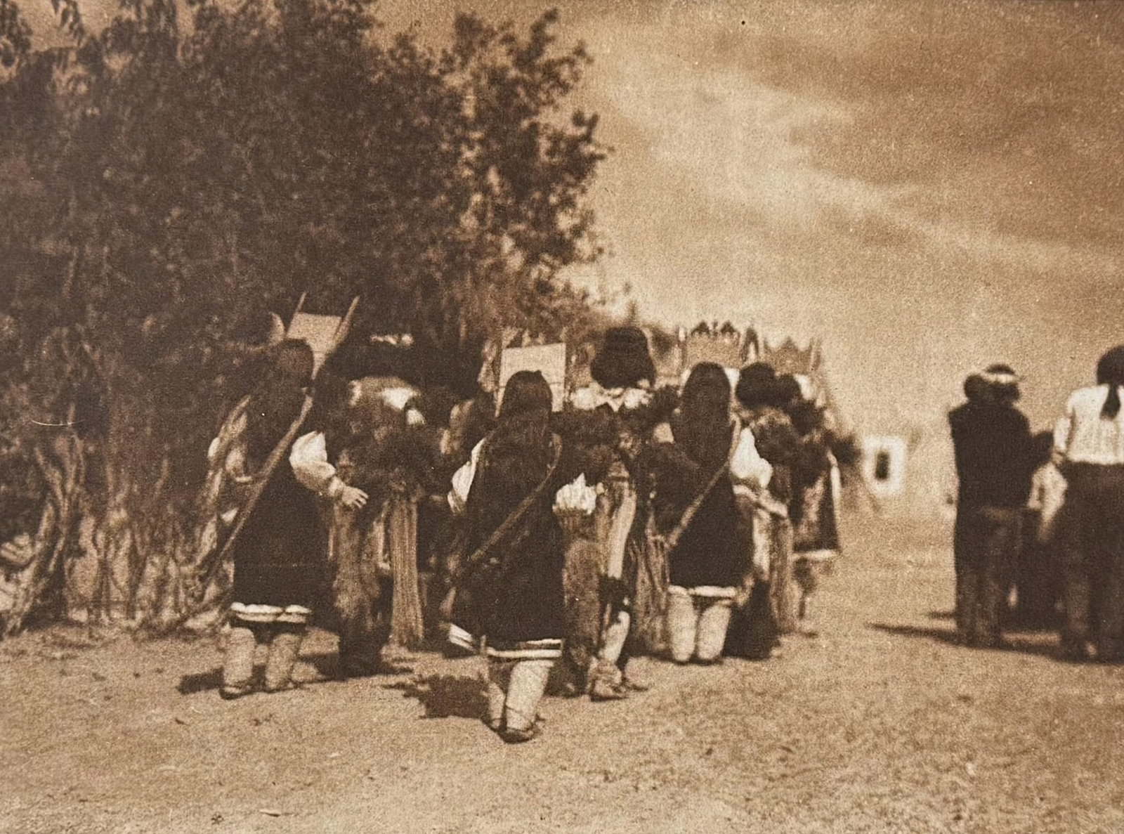Edward Curtis - Fiesta of San Estevan - Acoma: This moving photogravure in quarto size is from Edward Curtis's The North American Indian being a Series of Volumes Picturing and Describing the Indians of the United States and Alaska. Edited by Fred