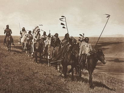 Edward Curtis, Folio - On the War-Path - Atsina: This moving photogravure in folio size is from Edward Curtis's The North American Indian being a Series of Volumes Picturing and Describing the Indians of the United States and Alaska. Edited by Frede
