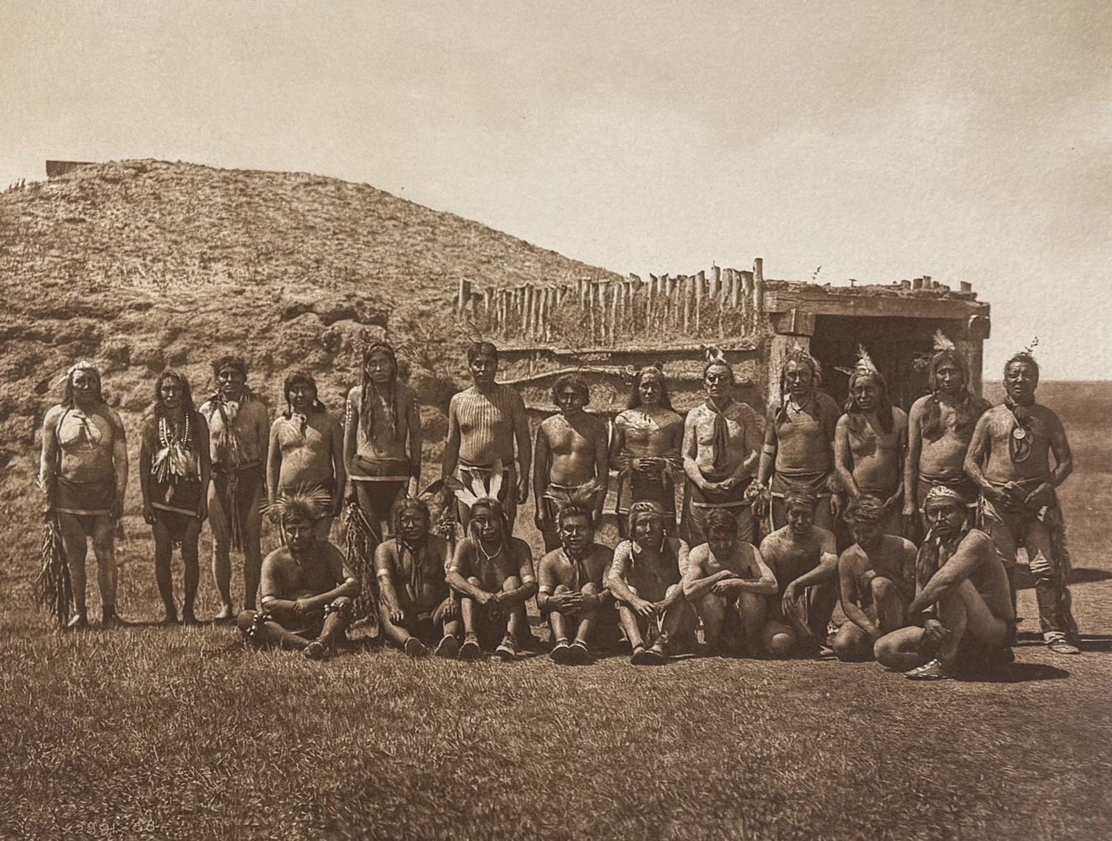 Edward Curtis, Folio - Arikara Medicine Fraternity. 157: This moving photogravure in folio size is from Edward Curtis's The North American Indian being a Series of Volumes Picturing and Describing the Indians of the United States and Alaska. Edited by Frede