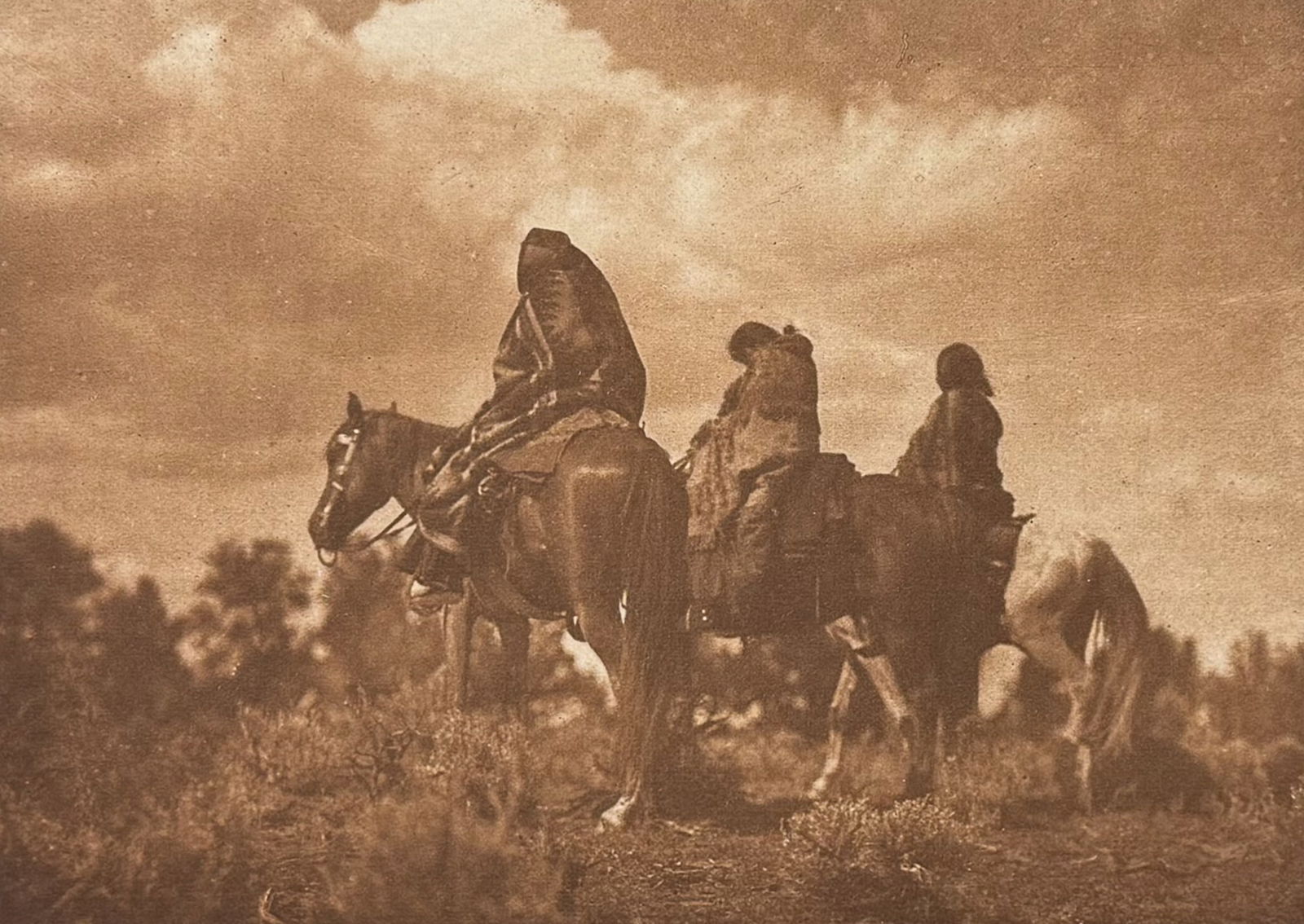 Edward Curtis - Navaho Women: This moving photogravure in quarto size is from Edward Curtis's The North American Indian being a Series of Volumes Picturing and Describing the Indians of the United States and Alaska. Edited by