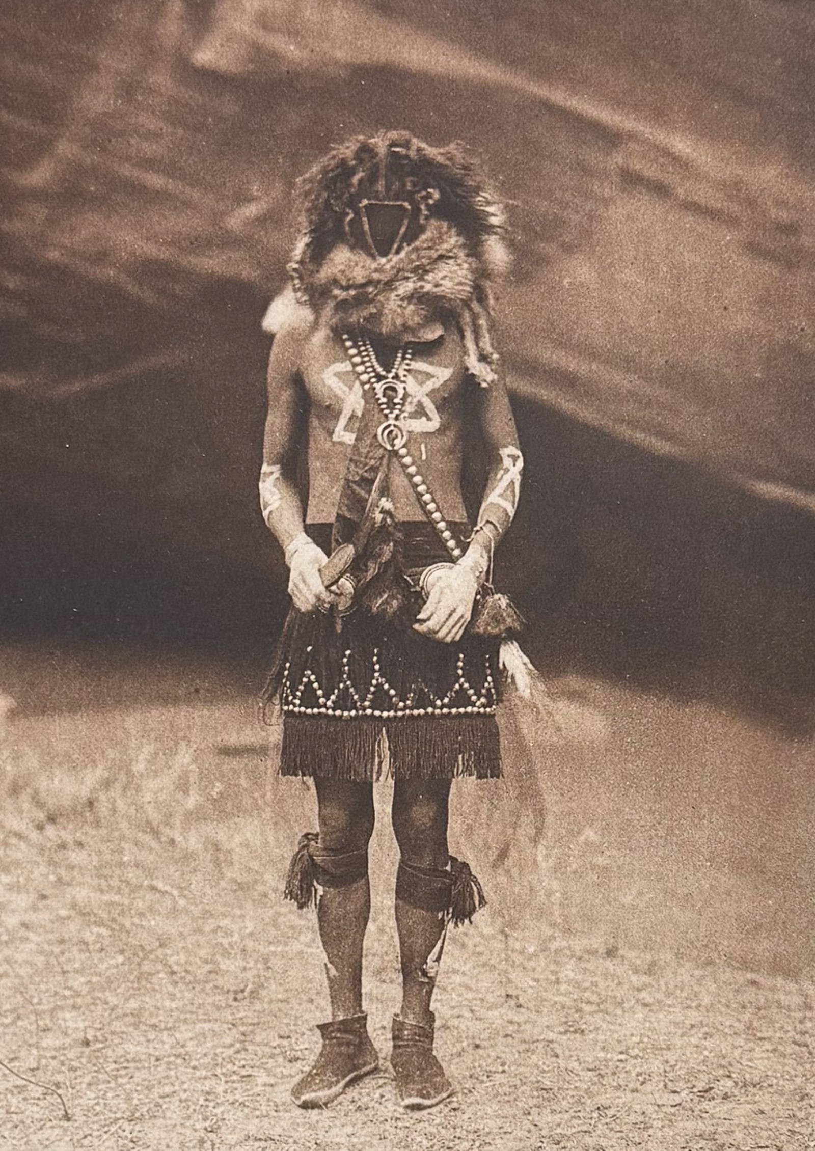 Edward Curtis - Tobadzischini - Navaho: This moving photogravure in quarto size is from Edward Curtis's The North American Indian being a Series of Volumes Picturing and Describing the Indians of the United States and Alaska. Edited by Fred