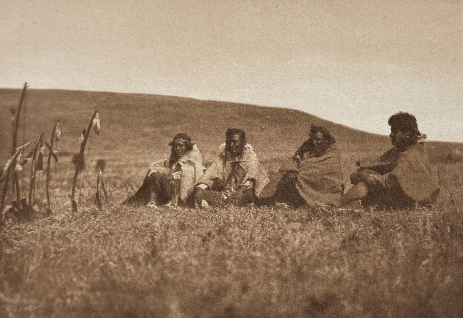 Edward Curtis - Singing in the Crazy Dance - Atsina: This moving photogravure in quarto size is from Edward Curtis's "The North American Indian being a Series of Volumes Picturing and Describing the Indians of the United States and Alaska. Edited by
