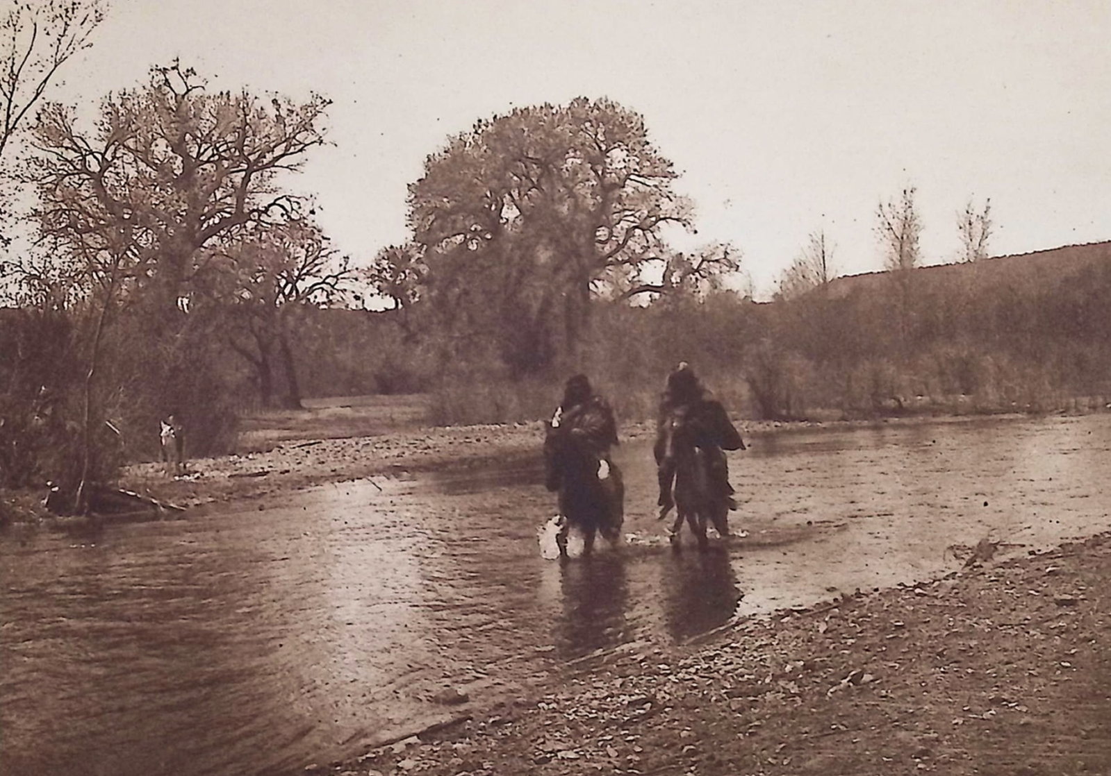 Edward Curtis - White River - Apache: This moving photogravure in quarto size is from Edward Curtis's The North American Indian being a Series of Volumes Picturing and Describing the Indians of the United States and Alaska. Edited by