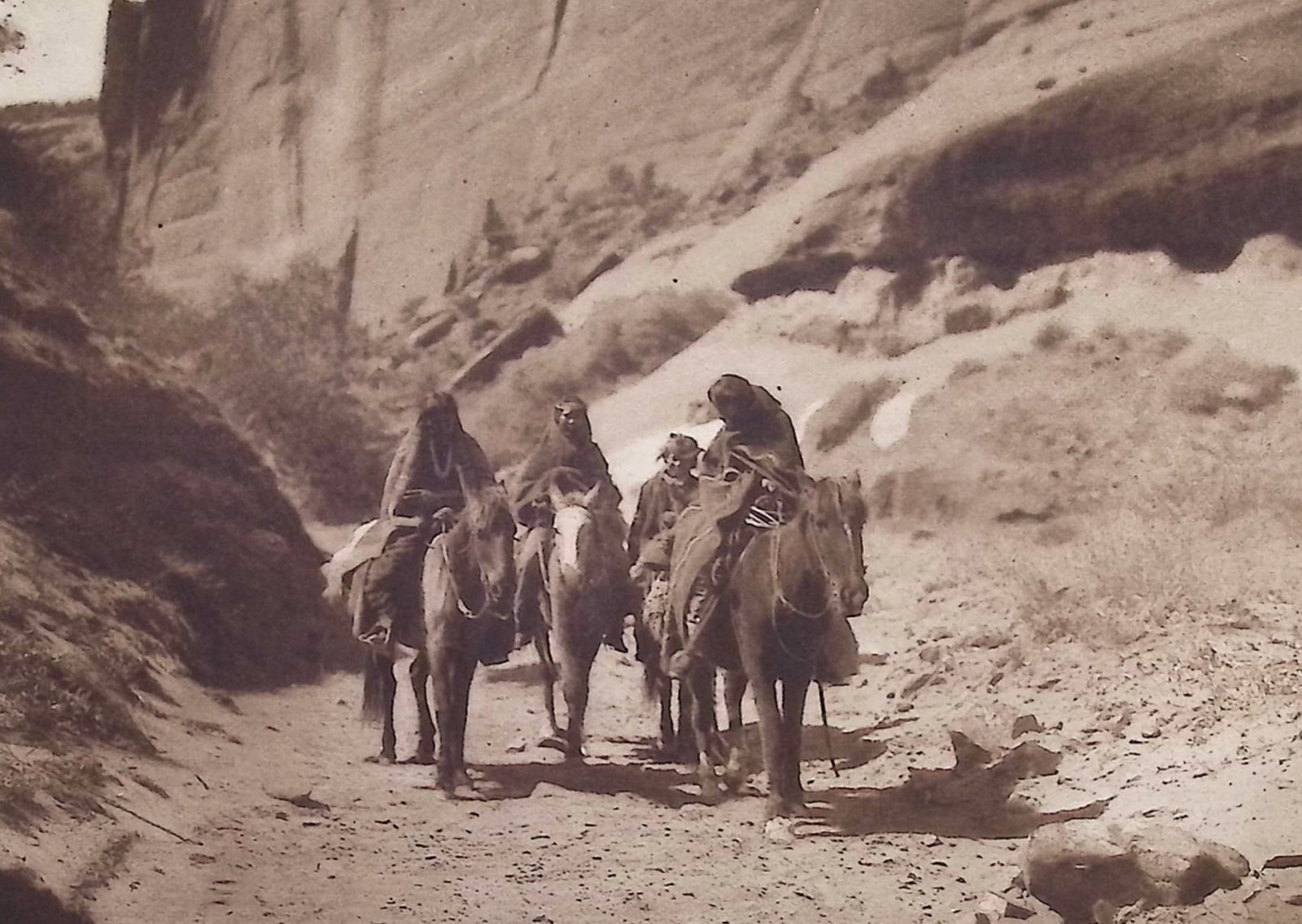 Edward Curtis - Through the Canon - Navaho: This moving photogravure in quarto size is from Edward Curtis's The North American Indian being a Series of Volumes Picturing and Describing the Indians of the United States and Alaska. Edited by