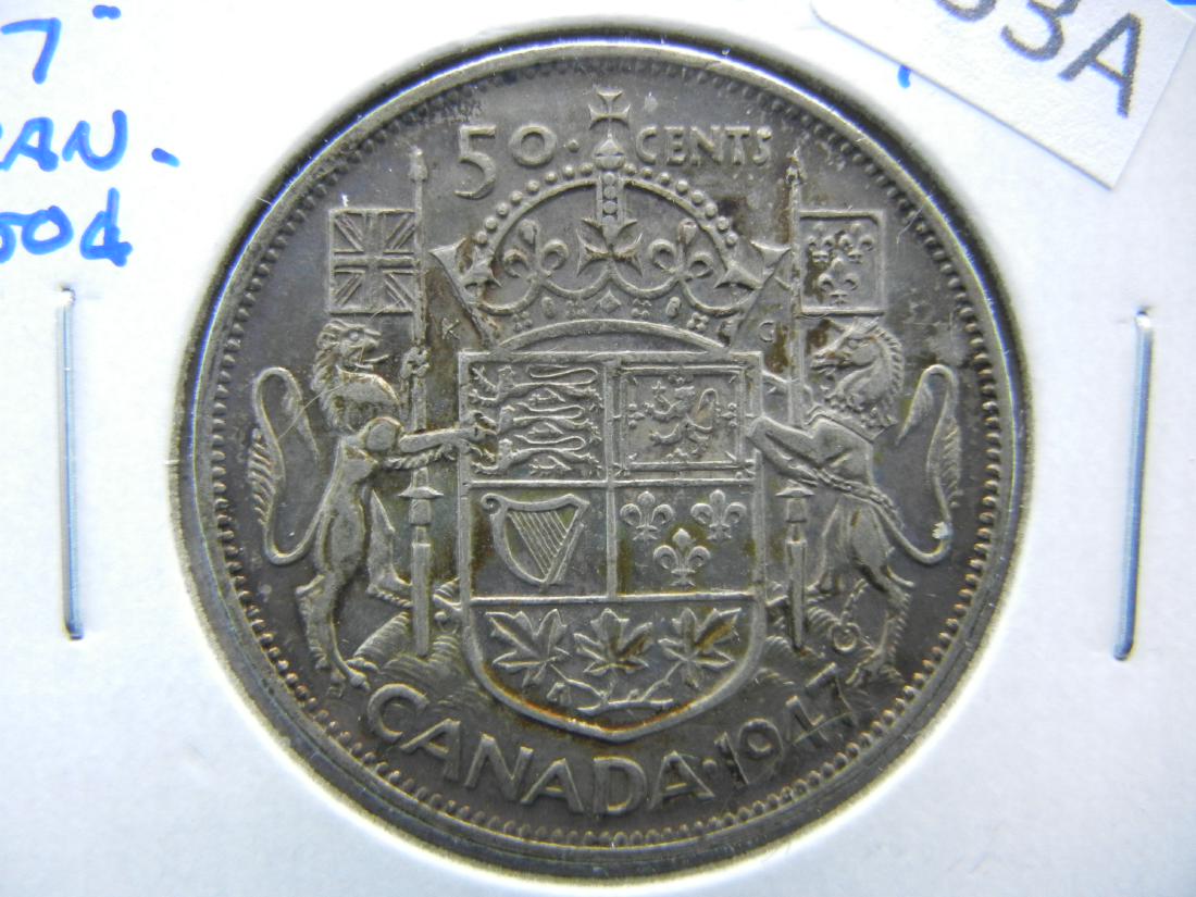 1947 Curved "7" Canada 50c.  High Grade.  AU. (1 of 3)