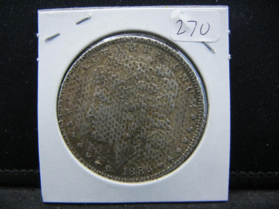 1886 Morgan Silver Dollar.: YES WE SHIP ALL COINS - $3.50 PLUS INSURANCE FOR ONE COIN for FIRST CLASS MAIL. We will combine shipping if multiple coins are purchased! Small flat rate $7.25 - Med Flat rate $13.95 - Large Flat Rate