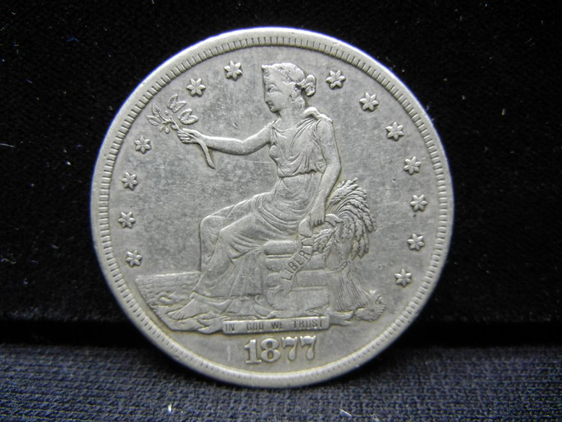1877-S US Trade Dollar with Historic Background (1 of 4)