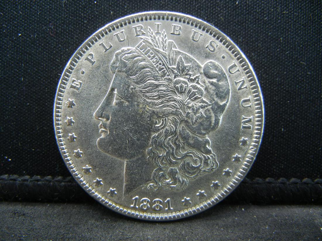 1881 Morgan Silver Dollar, Almost Uncirculated. (1 of 2)