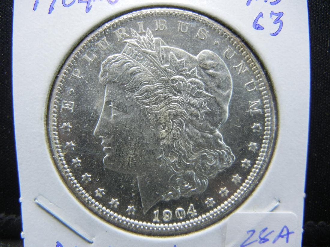 1904-O   Morgan Dollar.  MS63 Uncirculated with nice (1 of 3)