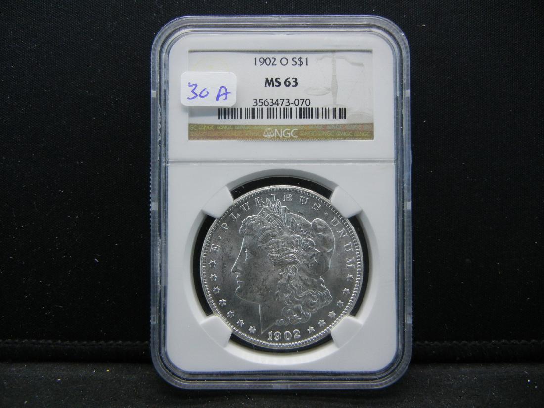 1902-O Morgan Silver Dollar.  Slabbed by NGC, one of (1 of 4)