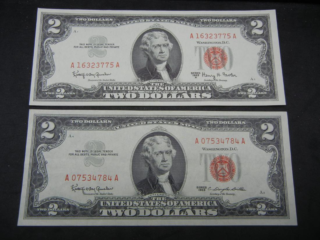 1963 and 1963 A Red Seal $2s. Both GEM Crisp: 1963 and 1963 A Red Seal $2s. Both GEM Crisp uncirculated.