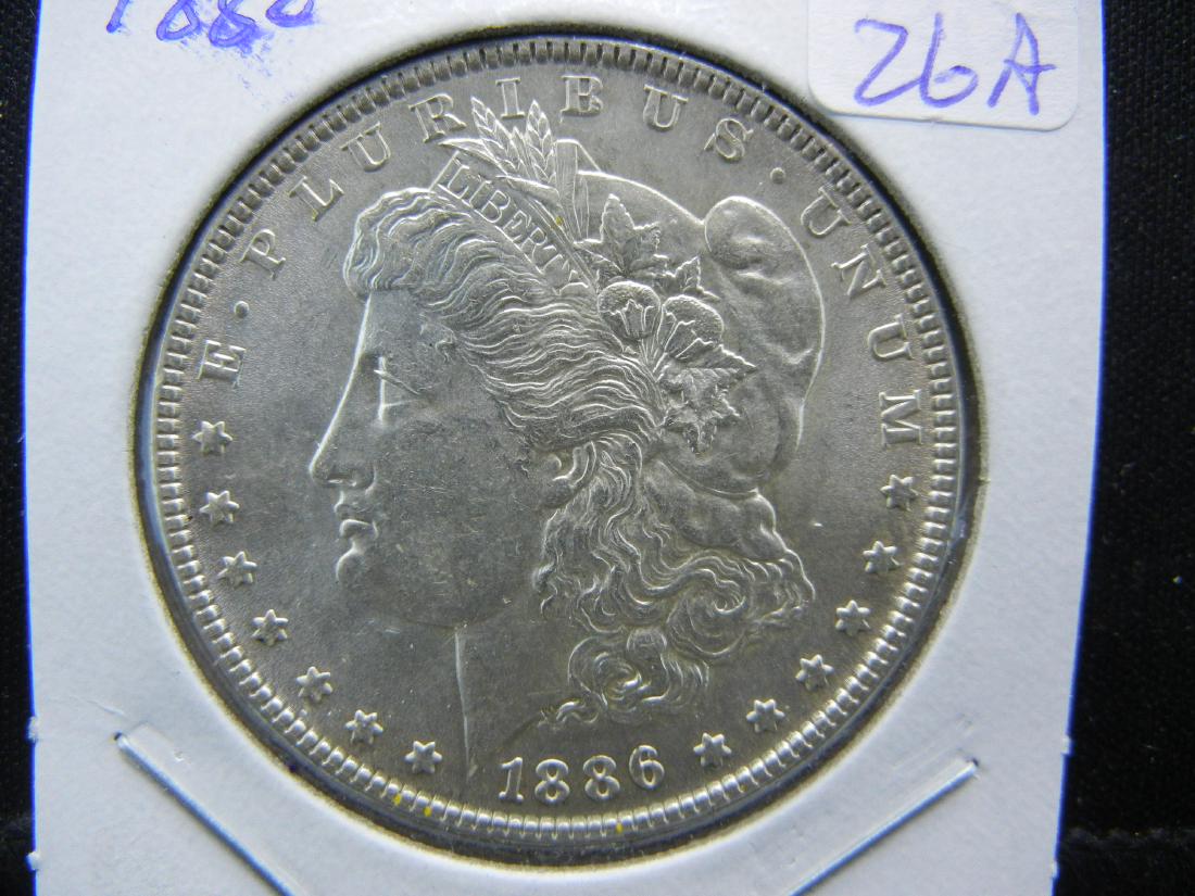 1886 Morgan Dollar.   White Brilliant Uncirculated. (1 of 3)