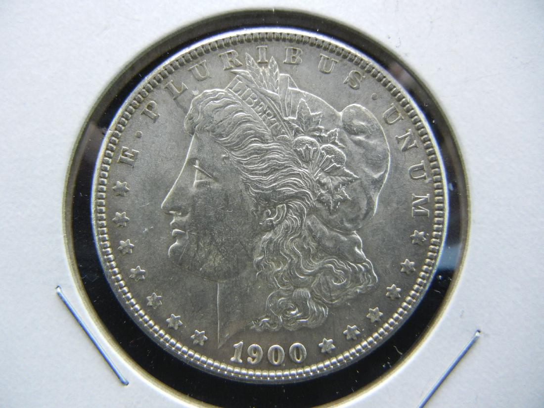 1900 Morgan Dollar. MS65. Rolling Flash! (1 of 3)