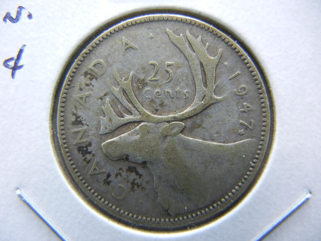 1947 Maple Leaf Canada Quarter Dollar.  VF. (1 of 3)