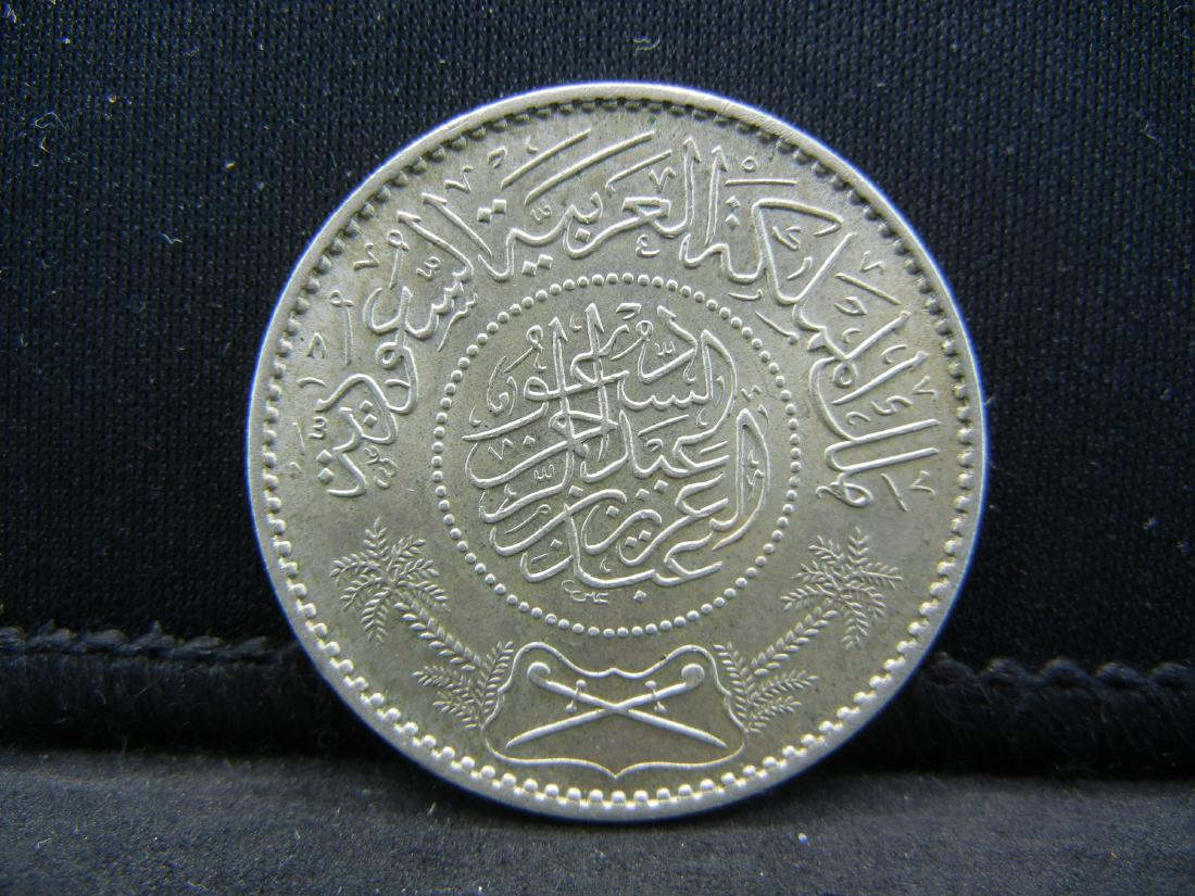 1935 Saudia Arabia 1 Riyal 91.7% Silver Coin. Weighs: 1935 Saudia Arabia 1 Riyal 91.7% Silver Coin. Weighs 0.38 Toz.