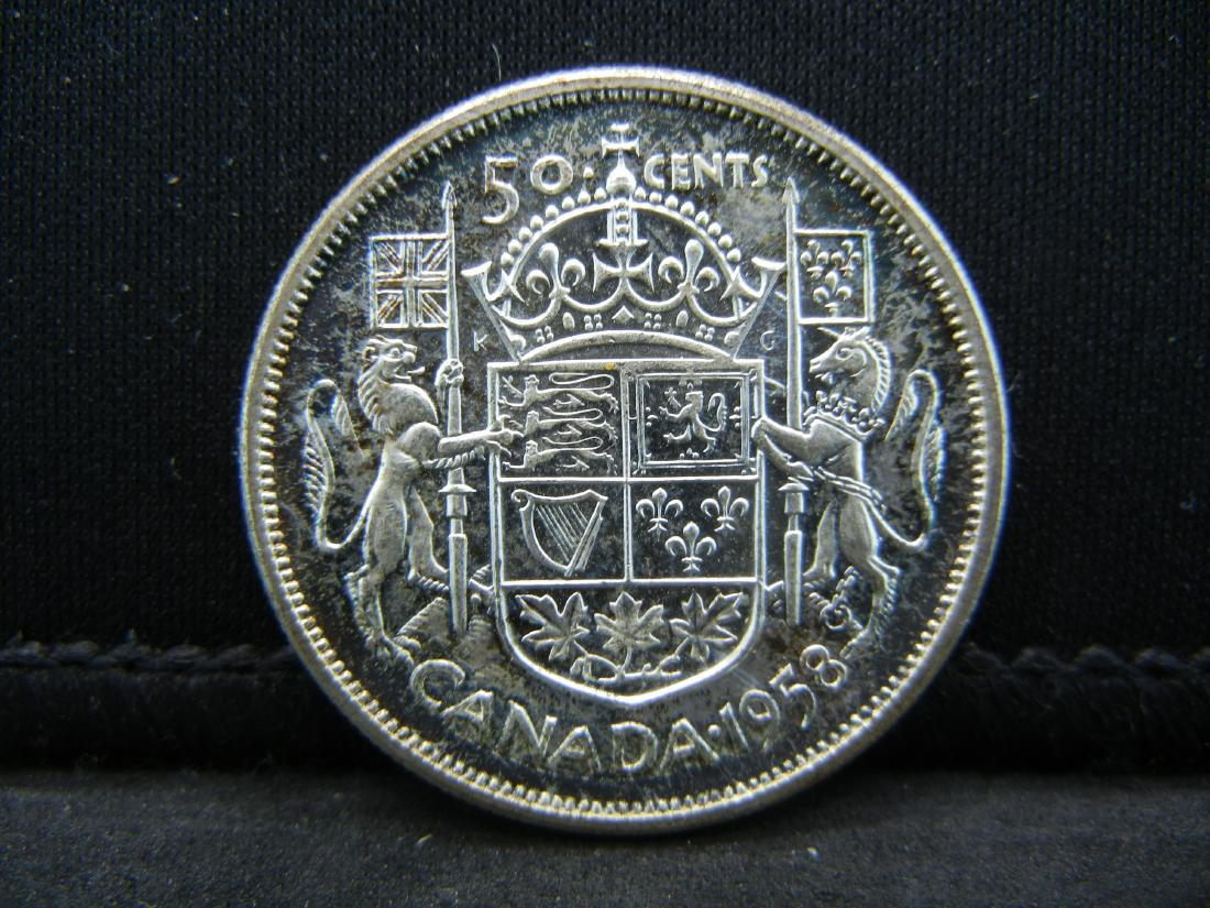 1958 Canada 80% Uncirculated Silver Half Dollar. (1 of 2)