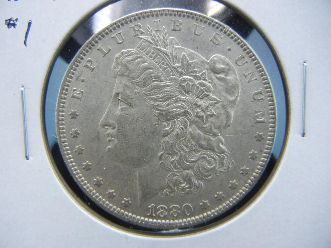 1880-O Morgan Dollar .  AU. (1 of 3)