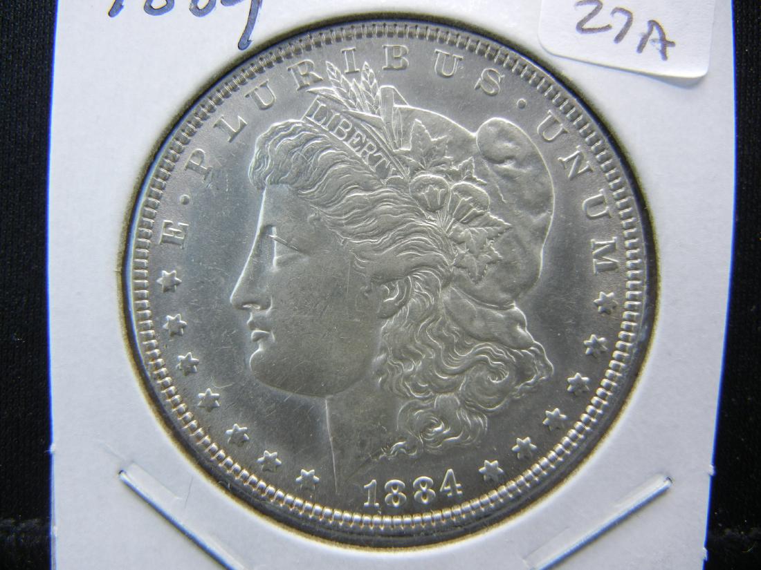 1884 Morgan Dollar. Better Philadelphia date.   Almost (1 of 3)