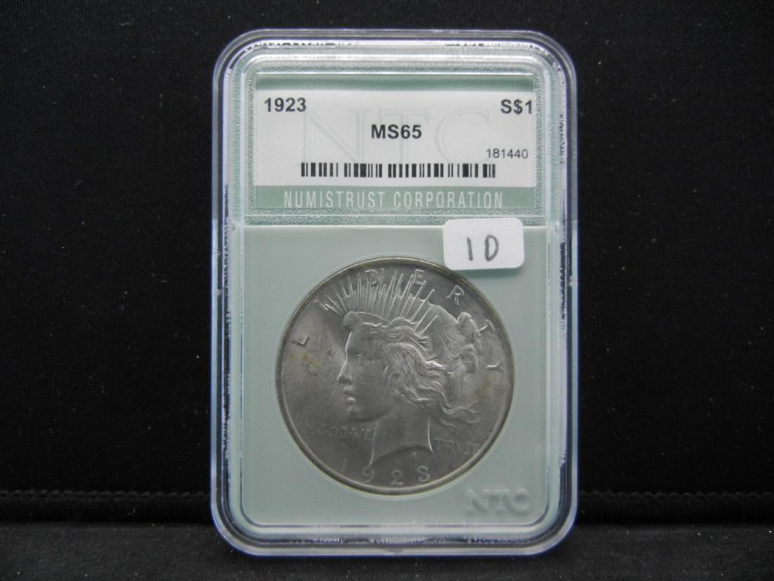 1923 Peace Silver Dollar NTC Grades as MS65 (1 of 4)