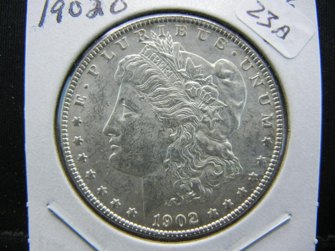 1902-O Morgan Dollar.  Brilliant Uncirculated with (1 of 3)