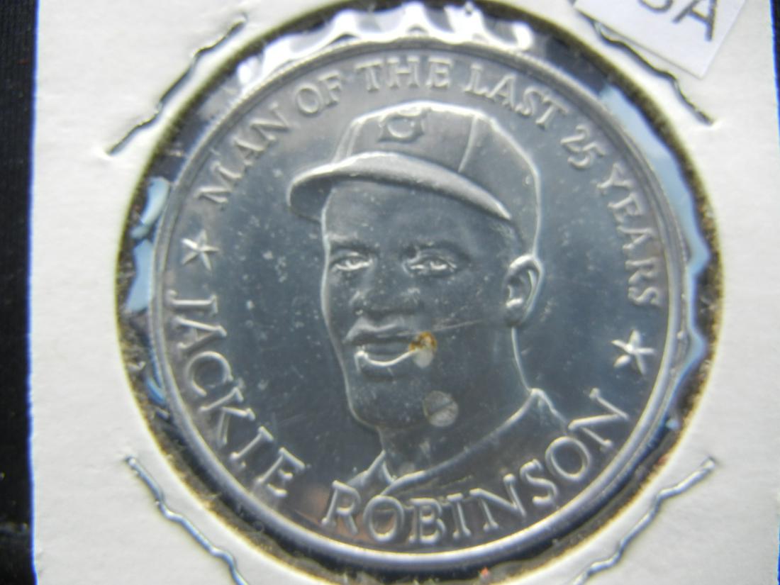 Jackie Robinson.  Dodgers #42. (1 of 3)